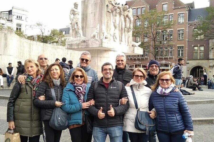 Amsterdam: Must-See Attractions Guided Walking Tour - Portuguese Synagogue and Nieuwmarkt Square: city layers beyond the postcards
