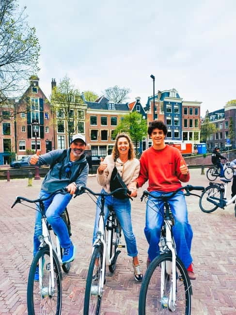 Amsterdam: Off the Beaten Path Bike Tour in French - Entrepotdok: Where the City Shows Its Work-Life Side