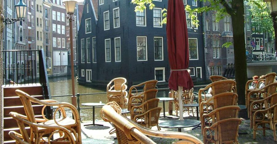 Amsterdam Old City Private Walking Tour - Medieval center moments: old city wall, hidden churches, and Oude Manshuispoort