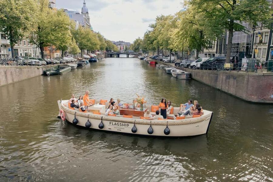 Amsterdam: Open Boat Cruise option Unlimited Drinks & Bite - Open-Boat vs Closed-Boat Comfort: How to Dress for the Weather