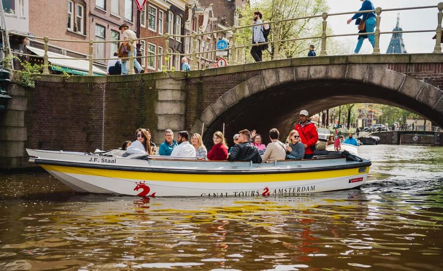 Amsterdam: Open Boat Tour of Canals with Expert Local Guide - Magere Brug: the classic Skinny Bridge moment