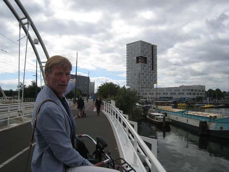 Amsterdam: Private Bike Tour - Albert Cuyp Street Market, experienced from a bike lane