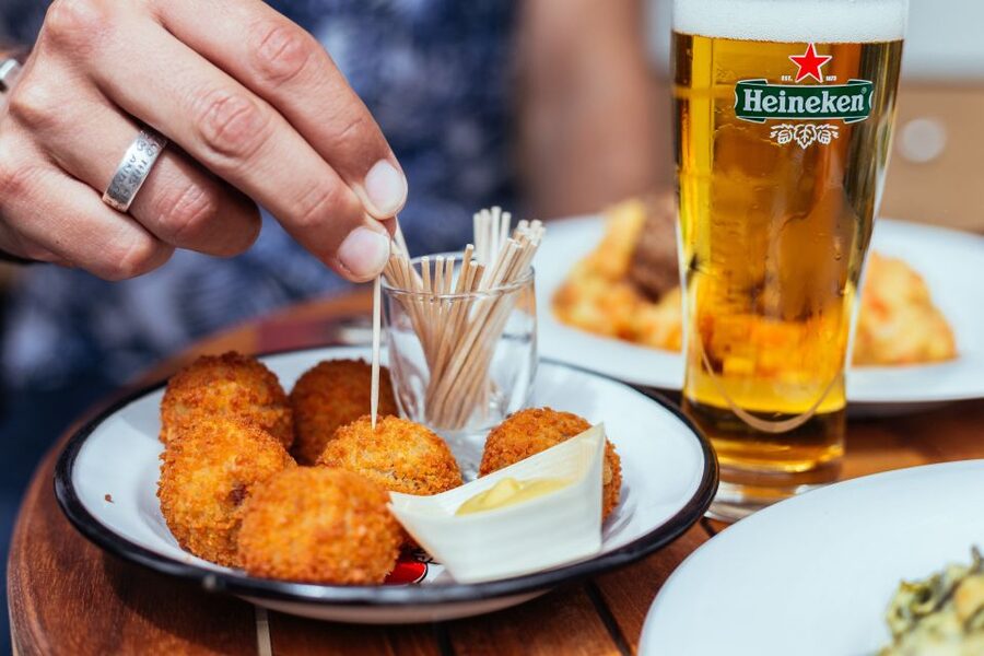 Amsterdam: Private Food Tour with a Local - The biggest market stop: graze, browse, and compare flavors