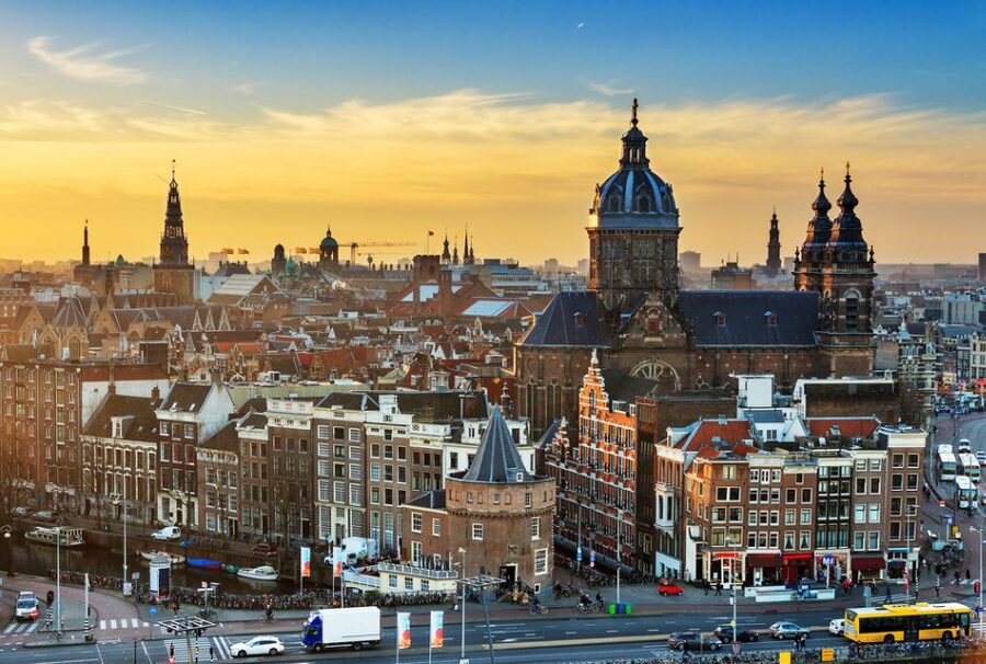 Amsterdam: Private Guided Walking Tour - Starting With Hotel Pickup, Then Walking the Real Amsterdam