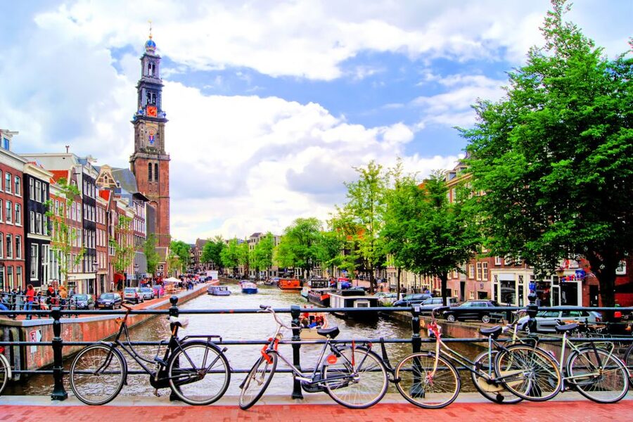 Amsterdam: Private Guided Walking Tour - Dam Square First, Royal Palace and the National Monument Setting the Tone