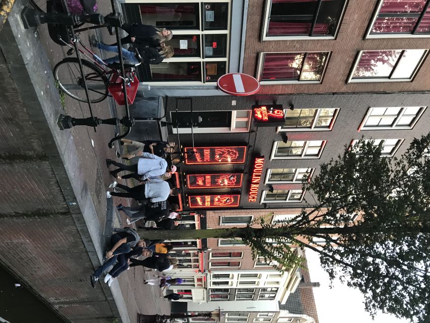 Amsterdam: Private Red Light District and Food Tour - Grachtengordel and Warmoesstraat, where the city changes tone