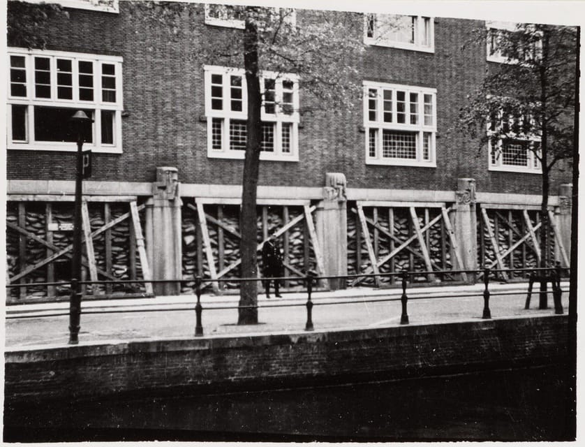 Amsterdam: Private World War Two History Walking Tour - From the Wehrmacht Entrance to a Grand Hotel Welcome Reversal