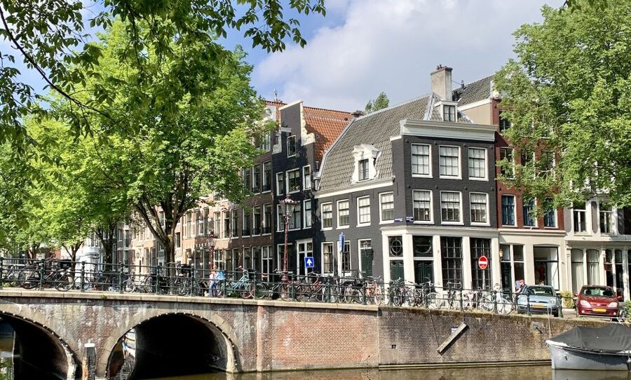Amsterdam: Red Light District & City Tour German or English - Entering the Red Light District with Context, Not Shock
