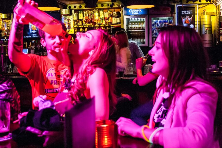 Amsterdam: Red Light District Pub Crawl with Unlimited Shots - Four pubs in Amsterdam’s adult nightlife zone: what each stop is really for