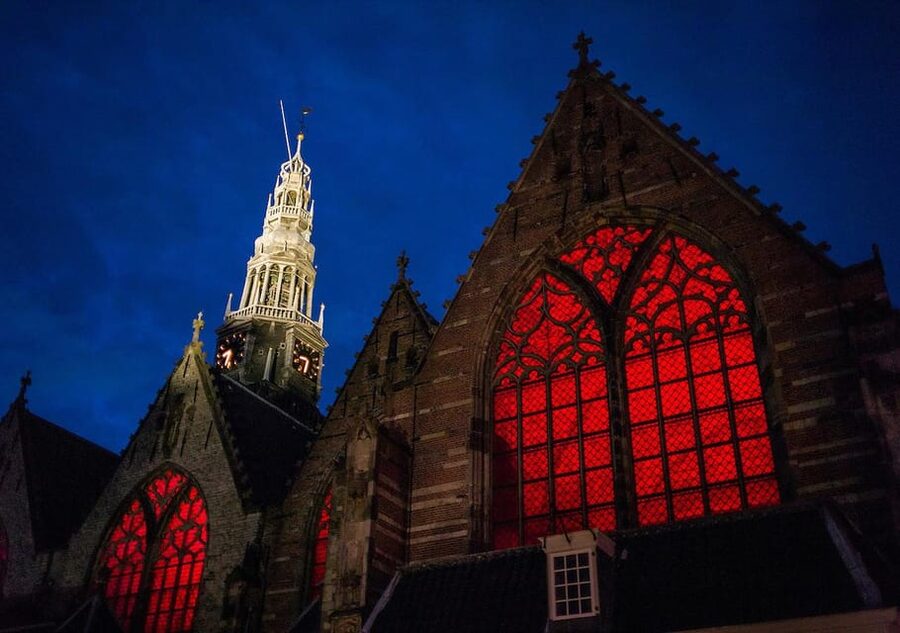 Amsterdam: Red Light Tour Exclusive + Peep Show - Condomerie and Oude Kerk: history you can feel under your feet