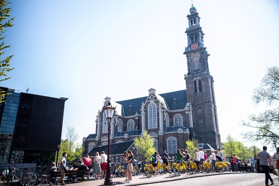 Amsterdam: Relaxed City Highlights Guided Bike Tour - The Jordaan quarter: picturesque canals, local feeling, and relaxed riding