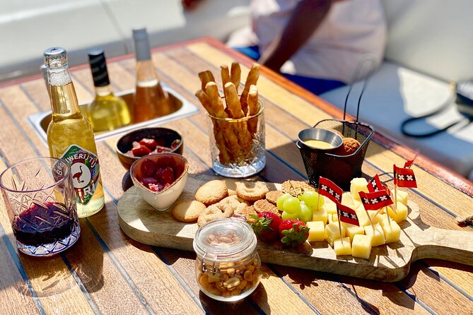 Amsterdam Small-Group Canal Cruise Including Snacks and Drinks - Westertoren and Anne Frank House From the Water, Without the Bridge Crowds