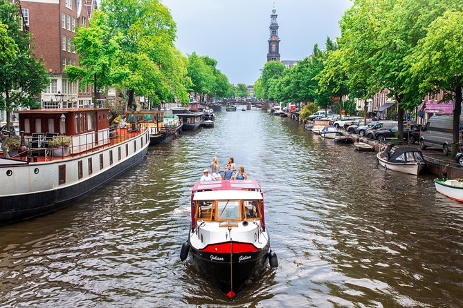 Amsterdam Small-Group Canal Cruise With Dutch Snacks and Drink - Westerkerk and the long canals: sights you can actually compare