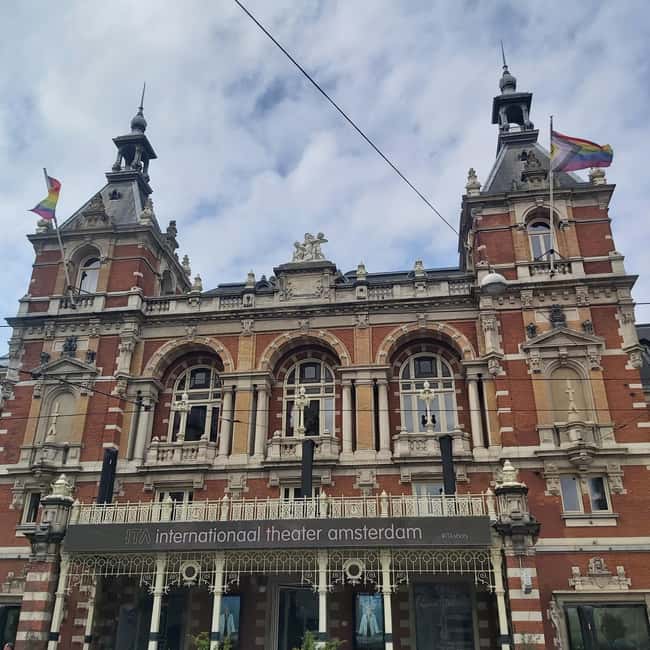 Amsterdam: Spanish Tour Unmasking the Redlight District - Starting at Barbizon Palace Hotel: the walking rhythm and what you’ll cover