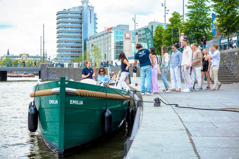 Amsterdam: The Newest Canal Cruise with Drink Option - Meeting at Amsterdam Central Station: getting on board without stress