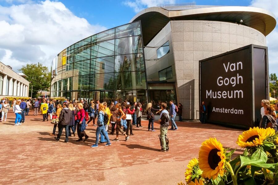 Amsterdam Van Gogh Museum Guided Tour with Tickets Included - Meeting point: Museumshop entrance, white umbrella, and a phone number that works