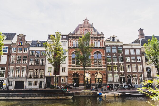 Amsterdam Walking Tour with Cheese Tasting - A 2.5-hour walk that connects trade, culture, and the darker chapters