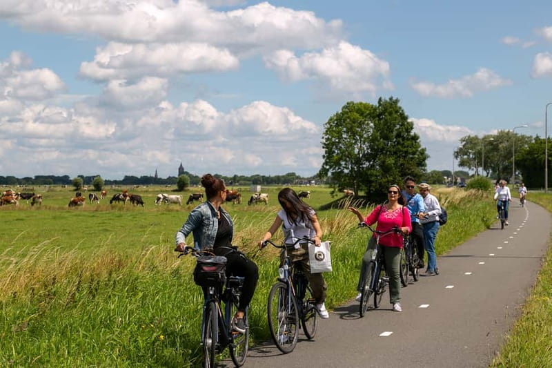 Amsterdam: Windmill, Cheese, and Countryside E-Bike Tour - Getting going from Piet Heinkade: ferry, A’DAM Tower, and an easy first rhythm