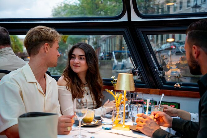Dinner Canal Cruise Amsterdam: 4-Courses Including Drinks - Service on a small boat: crew names, captain style, and the seating reality