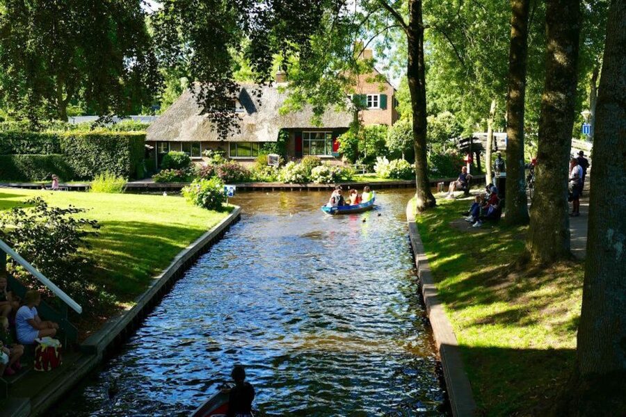 From Amsterdam: Private Tour to Giethoorn with Canal Cruise - Private pickup from Amsterdam to a calm village in about 3 hours