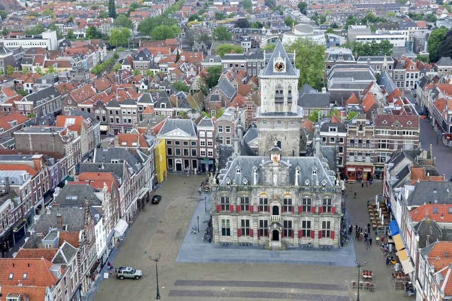 From Amsterdam: Rotterdam, The Hague & Delft Private Tour - Rotterdam by river and reinvention: WWII memory plus modern shapes