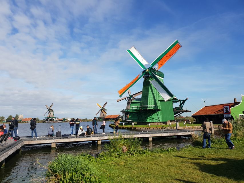 From Amsterdam: Small Group Zaanse Schans and Volendam Tour - Hotel pickup and the small-group 9-seater van setup