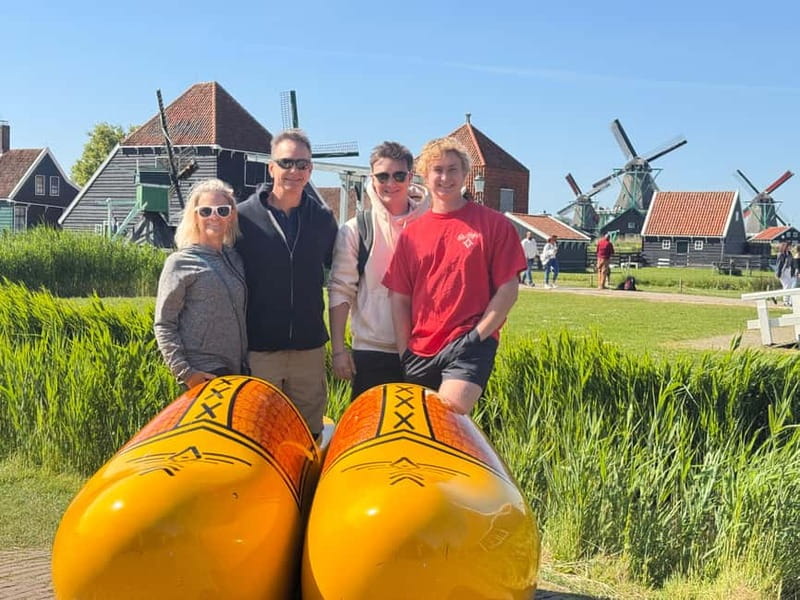 From Amsterdam: Zaanse Schans Windmills & More - E-Bike Tour - Getting Out of Amsterdam: Oudezijds Voorburgwal to Waterlands Reality