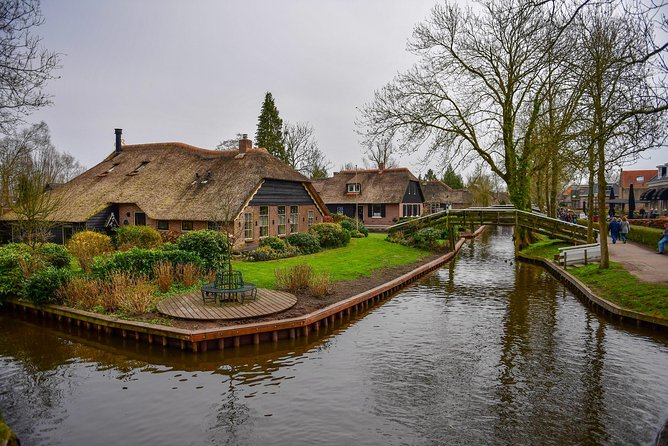 Giethoorn Guided DayTrip from Amsterdam - Riding Out of Amsterdam: Dams, Countryside, and Guide Stories