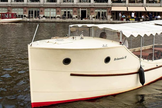 Guided Amsterdam Canal Cruise – Snacks & Drinks on board(1 Hour) - Snacks, drinks, and what the $21.77 price really buys