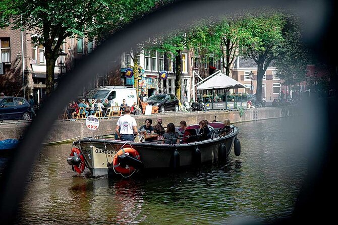 Guided Amsterdam Canal Cruise – Snacks & Drinks on board(1 Hour) - Meeting point reality check and how to avoid confusion