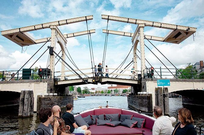 Guided Amsterdam Canal Cruise – Snacks & Drinks on board(1 Hour) - Who should book this cruise, and who should choose something else
