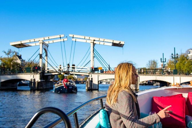 Guided Amsterdam Canal Cruise – Snacks & Drinks on board(1 Hour) - The iconic photo set: bridges, romance legend, and crooked canal houses