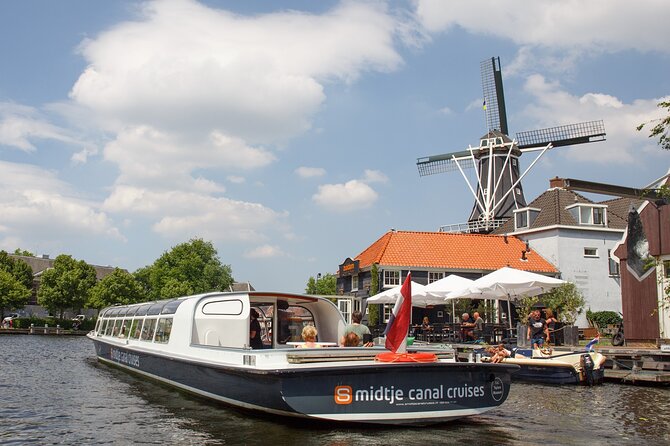 Haarlem: 50 minutes Boat Cruise - Haarlem Station, the Old Architecture Wall, and Why It Matters