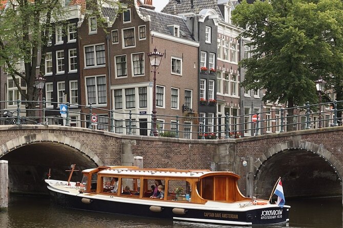 Morning Canal Cruise Amsterdam in Small-Group - Warm beverages and Dutch snacks that make the ride feel like morning, not a chore