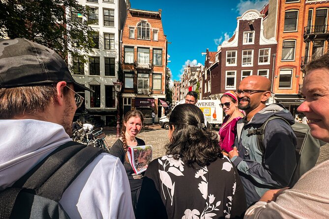 Small Group Walking Tour - Hello Amsterdam - Stop 3: Damrak by the Red Light District, a Culture Quiz You Can Actually Use