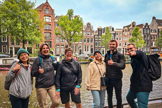 Small Group Walking Tour - Hello Amsterdam - Stop 4: Haarlemmersluis, the Canal Belt Meets Bike Reality
