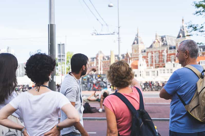 Small-Group Walking Tour with Amsterdam Canal Cruise - Beursplein to Dam Square: the Amsterdam you’ll recognize later