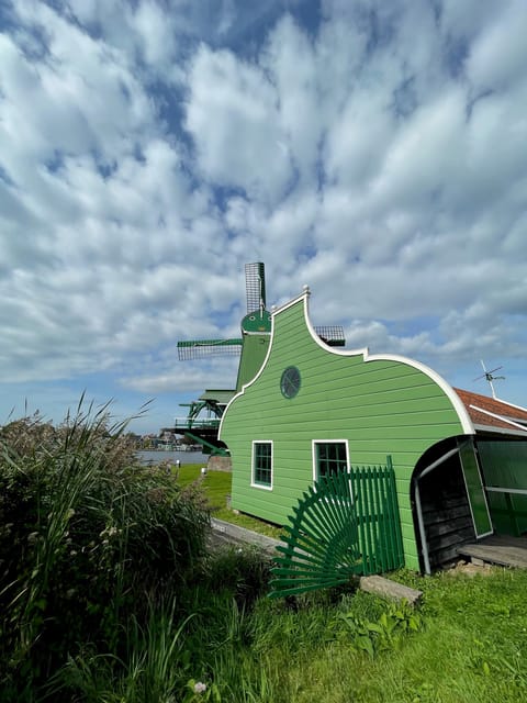 Zaanse Schans: Windmills, Clogs & Cheese by Electric Scooter - Arriving at Zaanse Schans: windmills, traditional houses, and the food stops